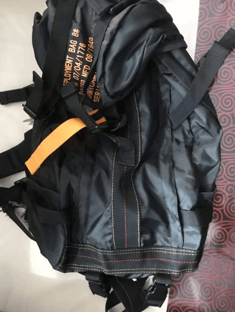 Men's durable tactical rucksack. FieldGear waterproof camping bag, large capacity for outdoor adventure gear.