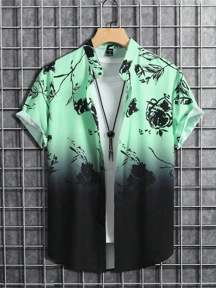 Close-up of men's floral short-sleeve collared shirt fabric. Highlights vibrant pattern and texture.