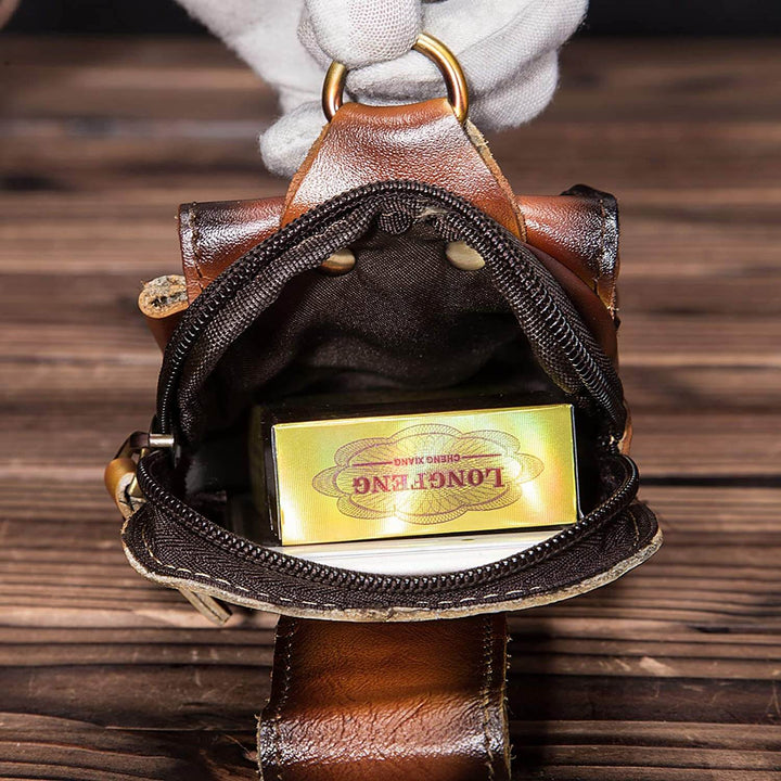 Sleek genuine leather men's fanny pack, offering secure storage & easy access.