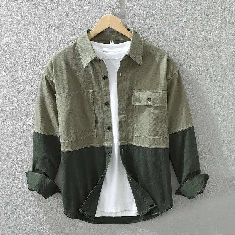 Men's green utility overshirt, a versatile casual layering piece for modern men's fashion. Relaxed fit outerwear.