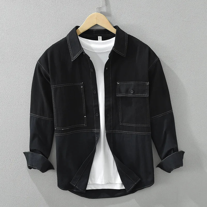 Black men's utility overshirt with pockets, perfect for casual wear and layering. Stylish and versatile men's shirt.