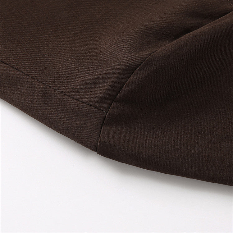 Front view of men's lightweight bomber jacket, showing vintage details and green color.