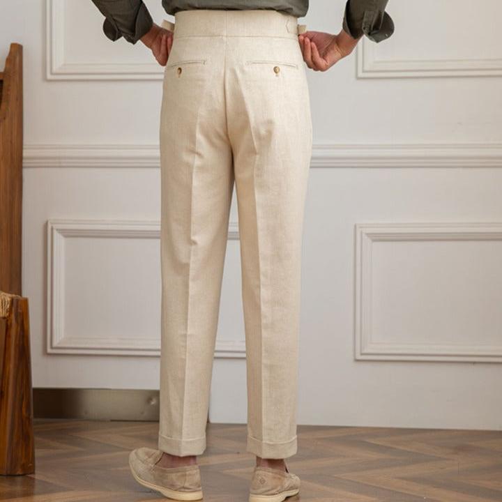 Side view of men's elegant high-waisted pleated trousers, great for formal wear and fashion.