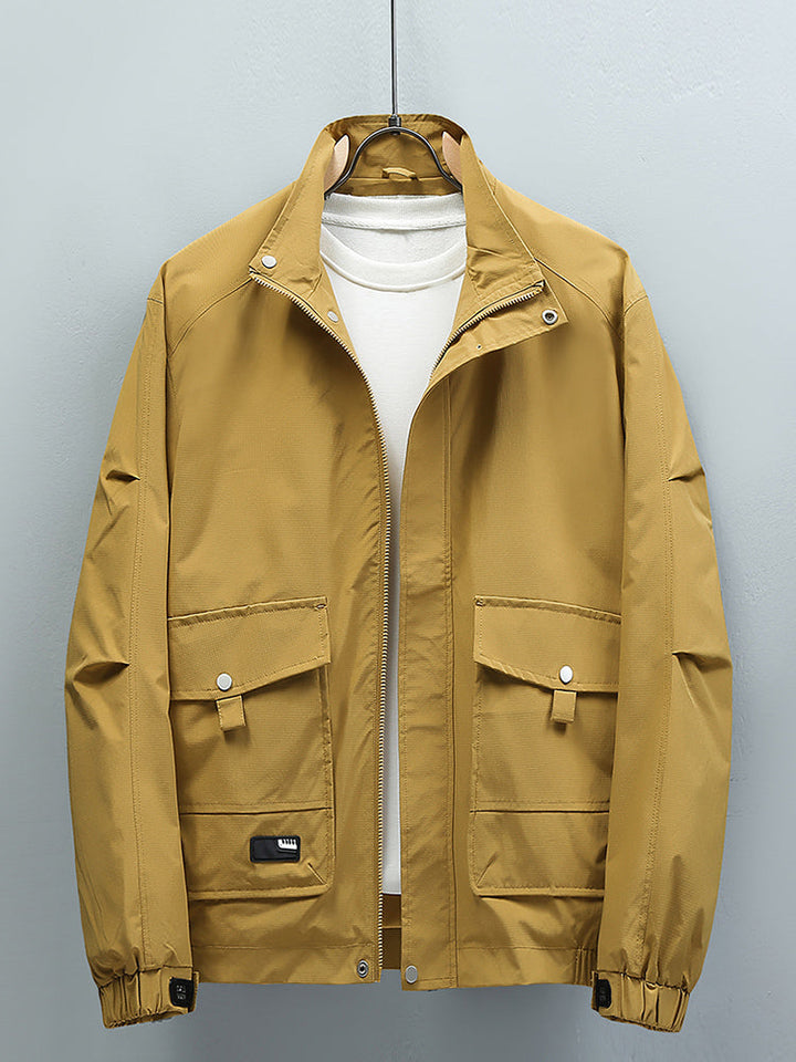 Insulated men's activewear jacket for cold weather outdoor workouts & autumn sports.