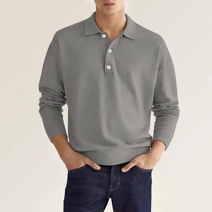 Close-up of a men's long sleeve knit polo shirt showcasing the fabric texture, great for autumn.