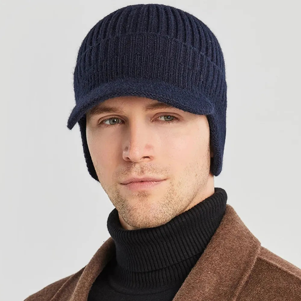Cozy men's knitted beanie with ear flaps for superior winter warmth. Acrylic, classic style.