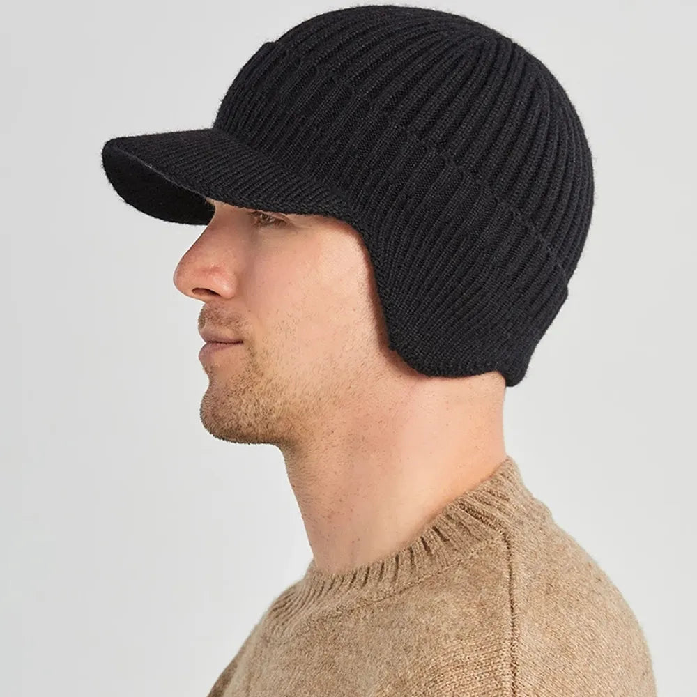 Men's winter hat: a knitted beanie with ear flaps, designed for ultimate cold weather protection.