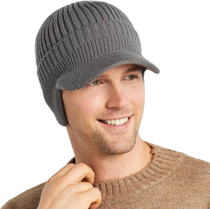 Men's cozy knitted beanie with ear flaps, providing excellent winter warmth and headwear protection.