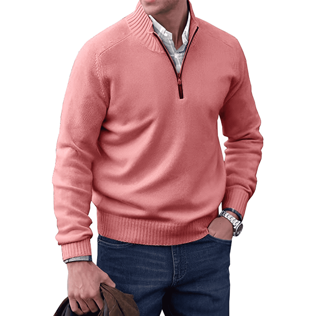 Detailed image of the rib-knit cuffs and hem on a men's casual half-zip pullover jumper.
