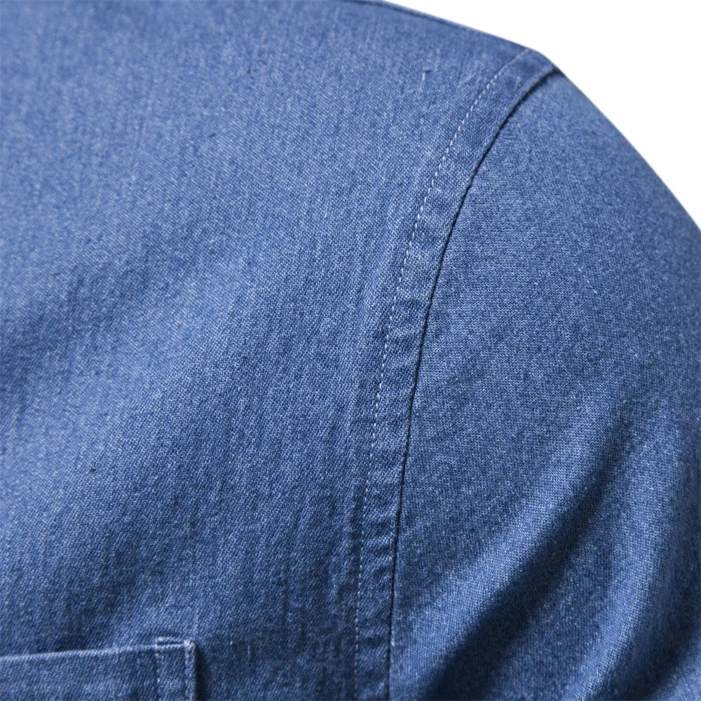 Stylish men's light blue denim shirt, featuring a classic button-up design