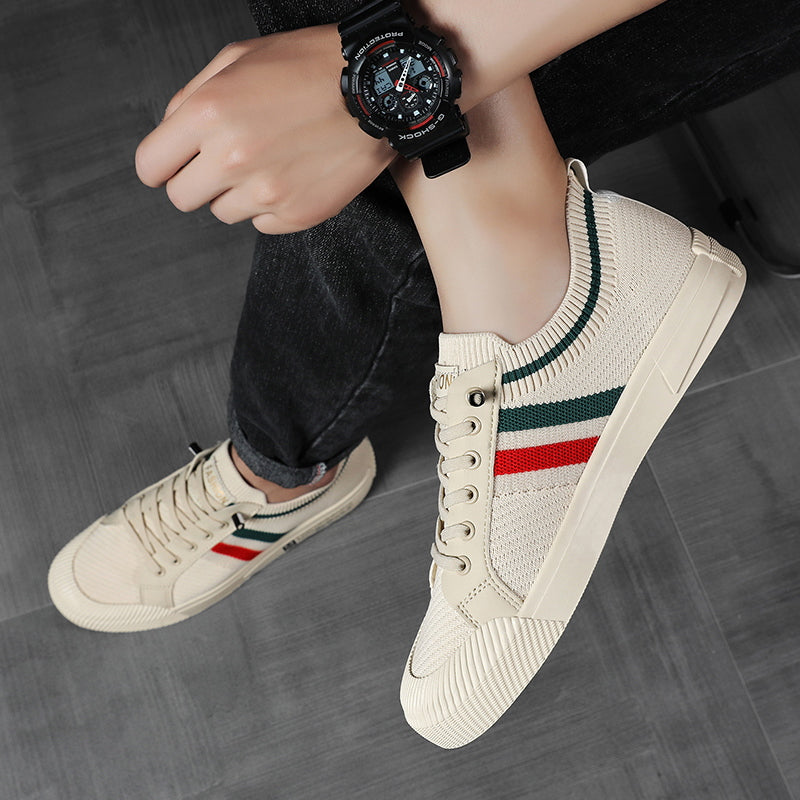 Durable, lightweight sole of men's breathable lace-up walking sneakers, designed for superior grip & all-day comfort.