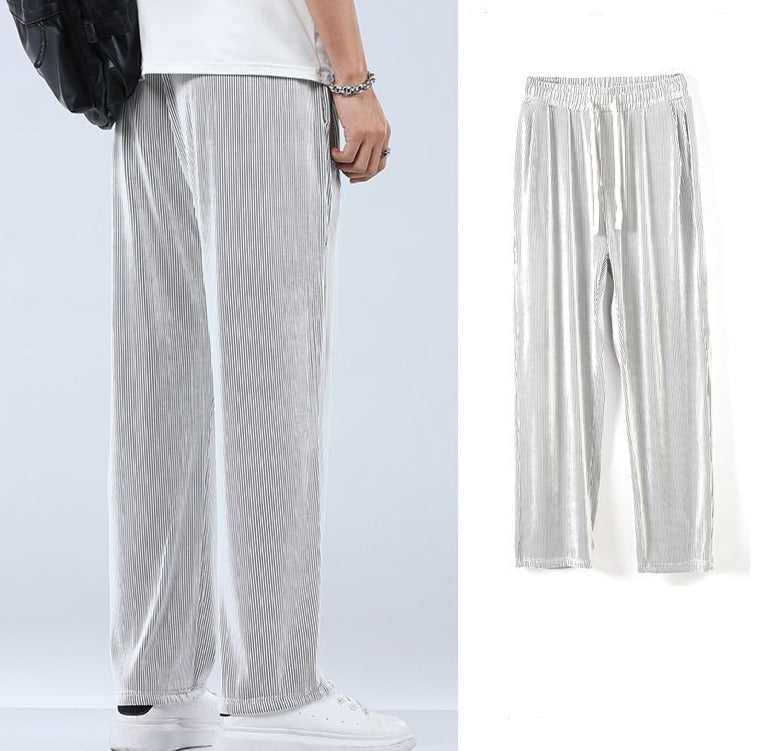Close-up of lightweight fabric on men's casual trousers, emphasizing comfort & breathable everyday wear.