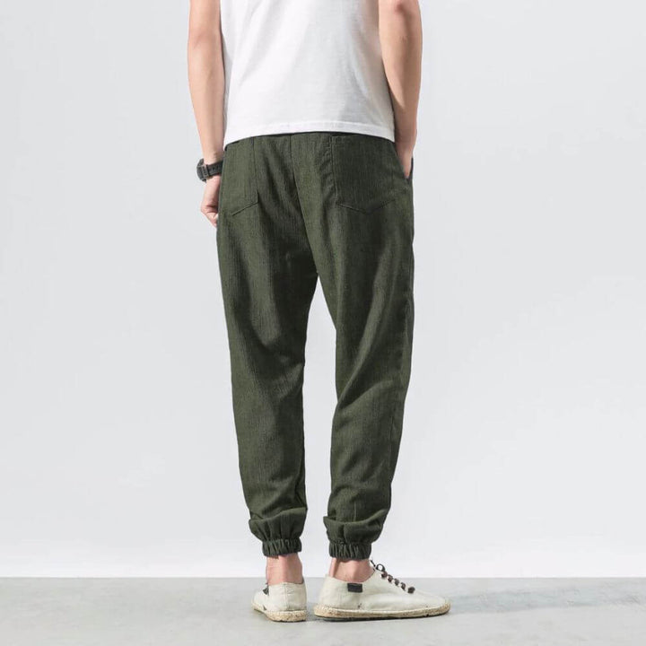 Comfortable men's drawstring jogger pants, versatile for summer fashion.