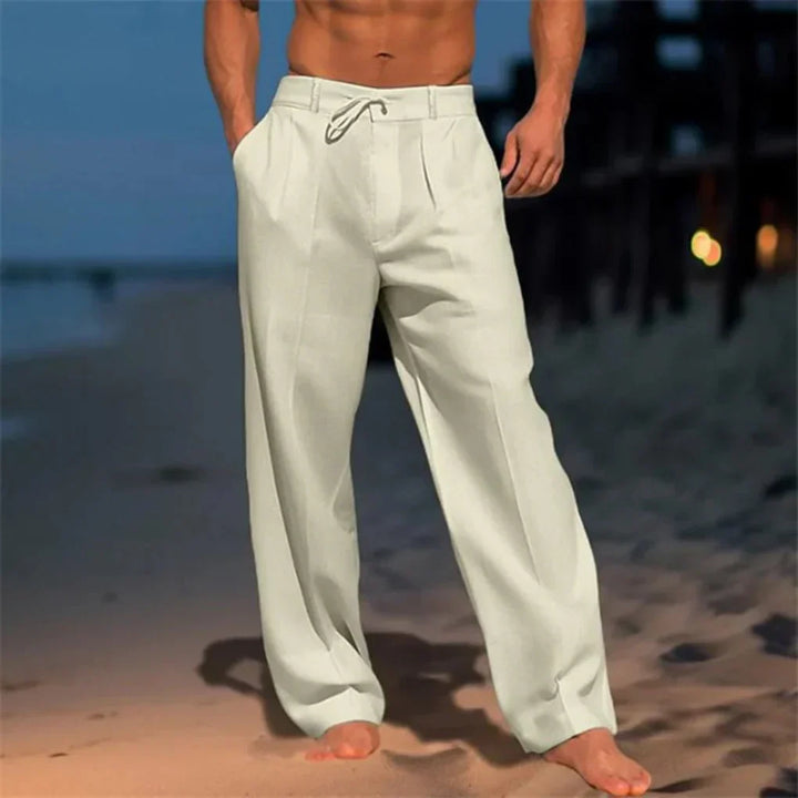 Relaxed fit men's linen trousers, offering ultimate summer comfort. Lightweight & breathable for casual wear.