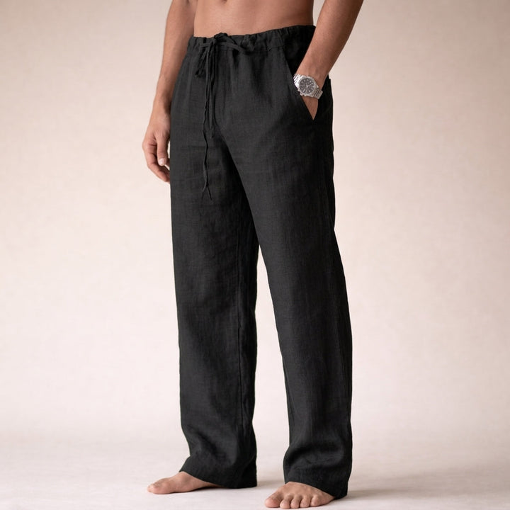 Textured close-up of men's premium linen trousers, highlighting the breathable fabric for summer comfort.