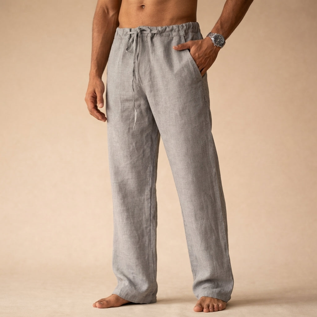 Elegant men's linen trousers paired with a light shirt, showcasing versatile summer casual and semi-formal looks.