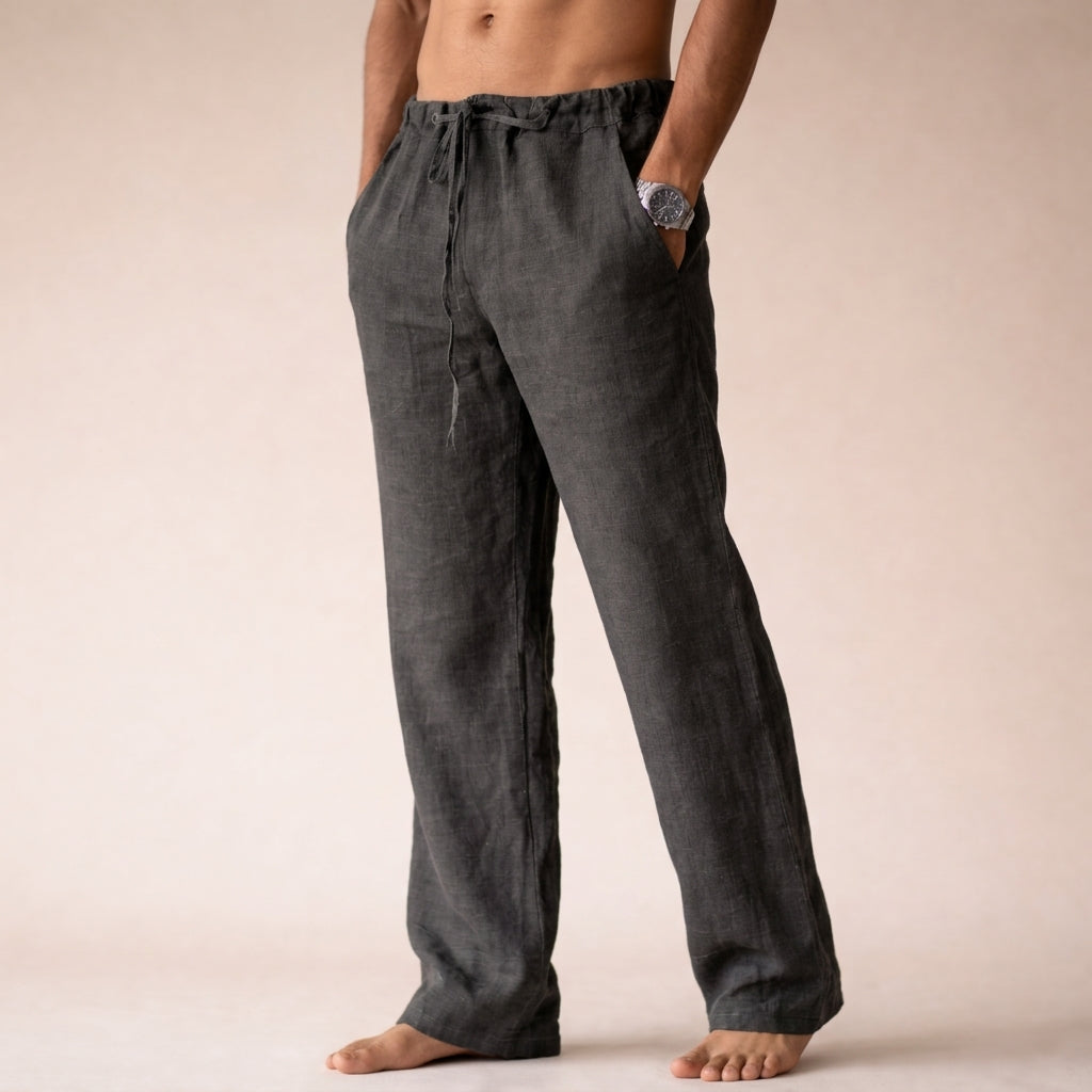 Man wearing comfortable men's linen trousers, perfect for a relaxed yet elegant summer stroll or holiday.