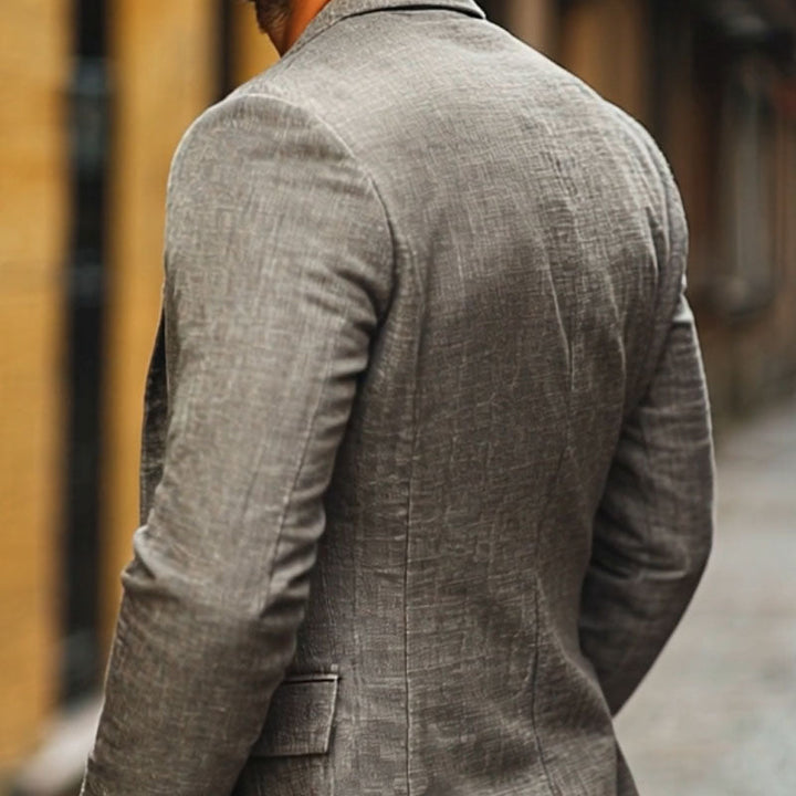 Men's slim fit single-breasted lightweight blazer. Perfect for warm weather, business casual events, and summer wedding attire.