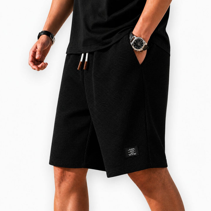 Comfortable men's travel shorts, ideal for vacation, warm weather, and relaxed summer apparel.