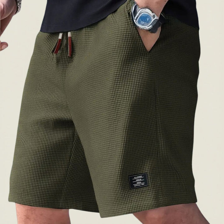 Drawstring casual men's shorts, lightweight & comfortable, ideal for summer apparel & travel.