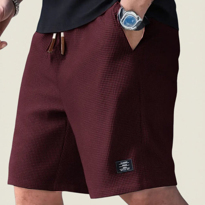 Ultimate comfort men's summer shorts, lightweight with relaxed fit & elastic waist for leisure.