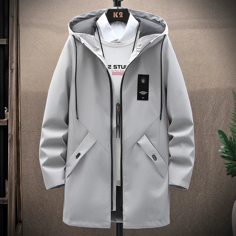 Stylish men's hooded long fit winter coat, perfect for autumn and cold weather. Durable versatile outerwear.