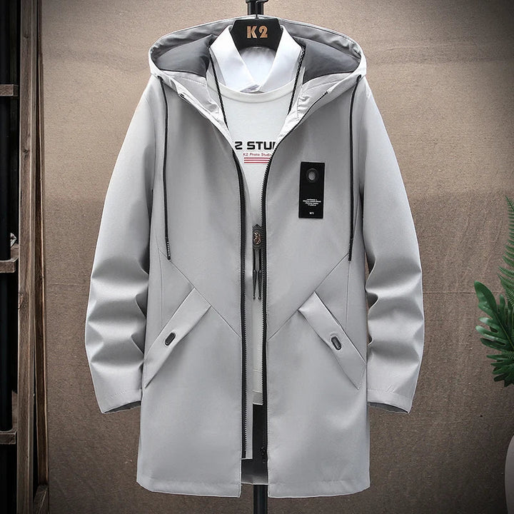 Stylish men's hooded long fit winter coat, perfect for autumn and cold weather. Durable versatile outerwear.