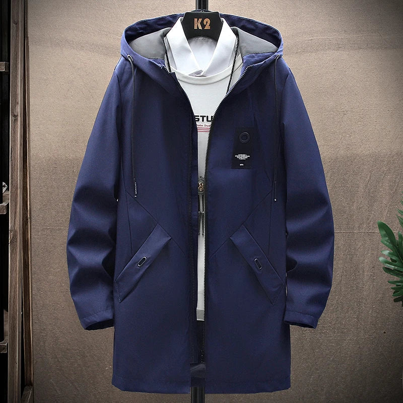 Men's long fit hooded winter jacket, a casual & stylish choice for cold weather. Essential men's outerwear.