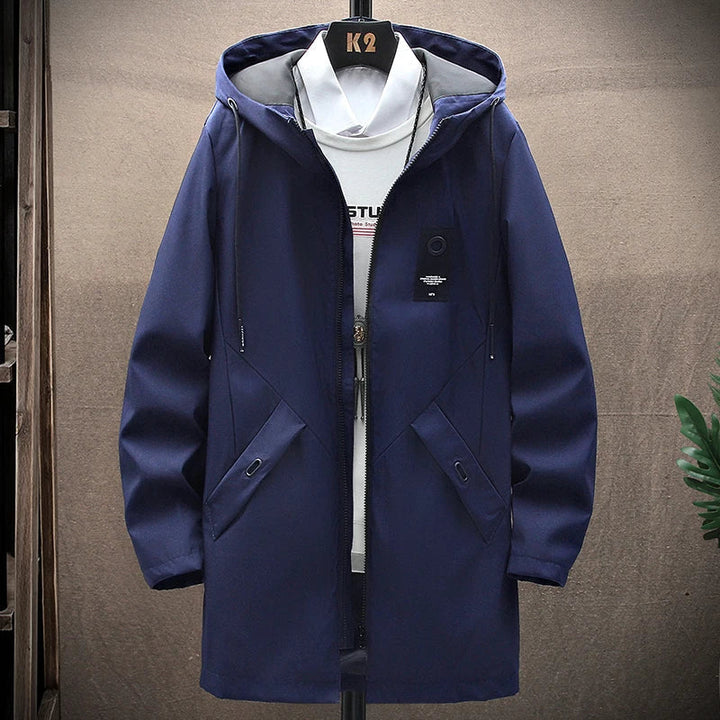 Men's long fit hooded winter jacket, a casual & stylish choice for cold weather. Essential men's outerwear.