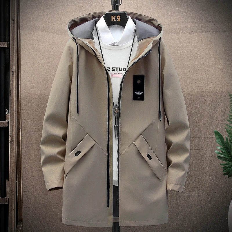 Close-up of men's long hooded winter jacket, Damian, showing fabric texture & quality for cold weather style.