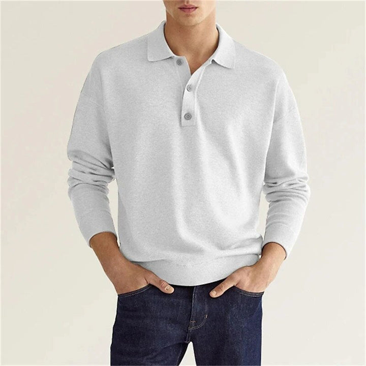 Bastien men's long sleeve polo shirt. Classic button collar and regular fit ensure style & comfort for casual wear.