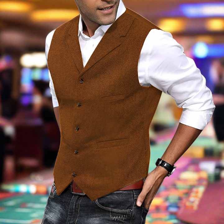 Man wearing an elegant longline V-neck suit vest, ideal for a refined formal or business look.