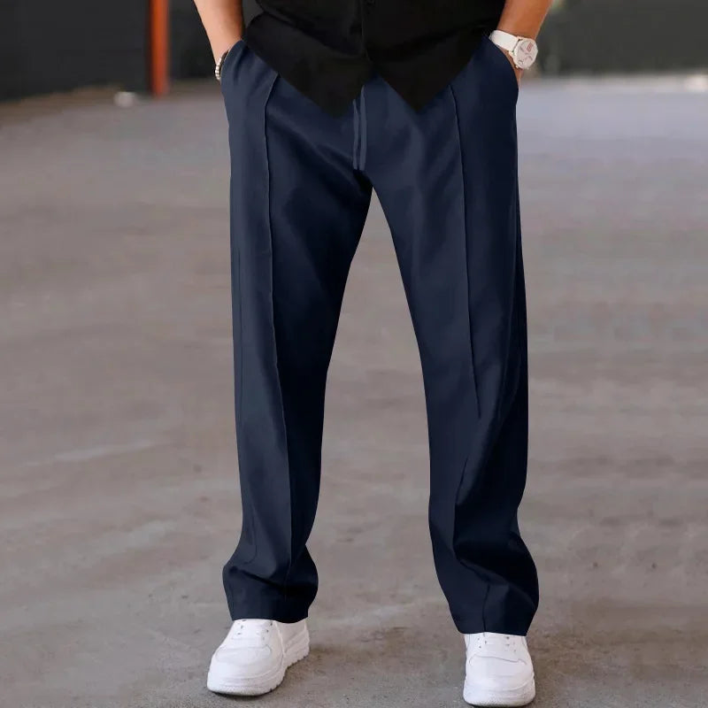 Men's loose-fit formal trousers in charcoal gray, perfect for business attire and workwear.