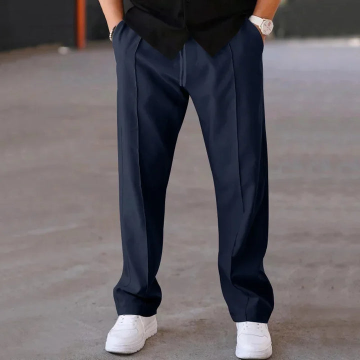 Men's loose-fit formal trousers in charcoal gray, perfect for business attire and workwear.