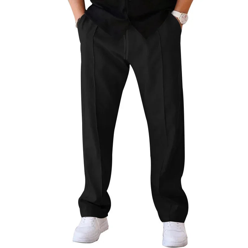 Close-up of the zipper and button closure on men's loose-fit formal trousers, quality details.