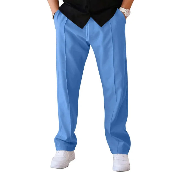 Men's loose-fit formal trousers in a timeless beige, perfect for spring and summer business attire.