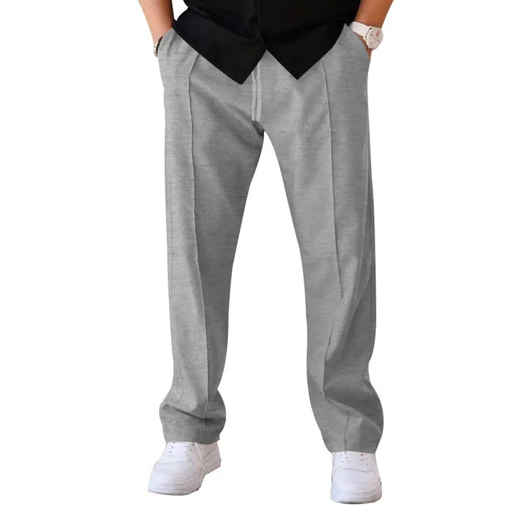 Durable men's loose-fit formal trousers, built for long-lasting comfort and workwear demands.