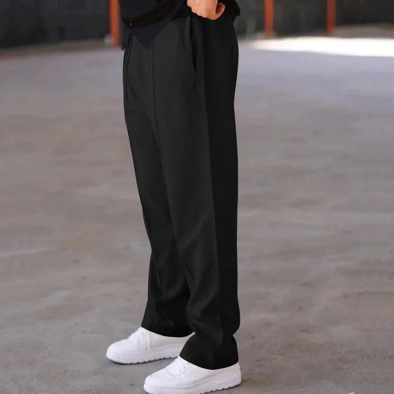 Comfortable men's loose-fit formal trousers in a dark brown, a versatile addition to workwear.