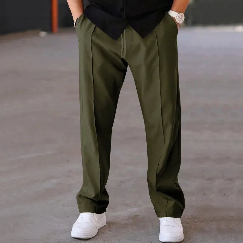 Side view of men's loose-fit formal trousers, highlighting the comfortable drape and classic cut.