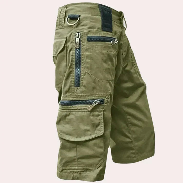 Man wearing men's Luca cargo shorts, perfect for summer outdoor adventures & casual leisure. Comfortable & durable.