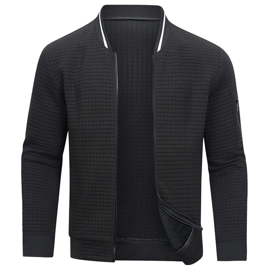 Detailed shot of men's Mitchell full-zip cardigan showing the textured grid knit & durable zipper closure.