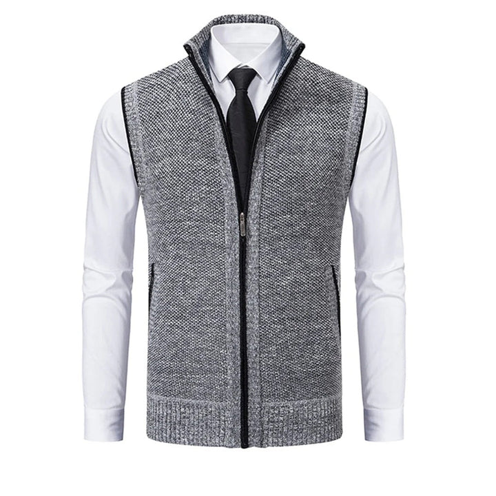 Back view of tailored men's suit vest, showcasing adjustable strap and flattering, modern fit. Formal attire.
