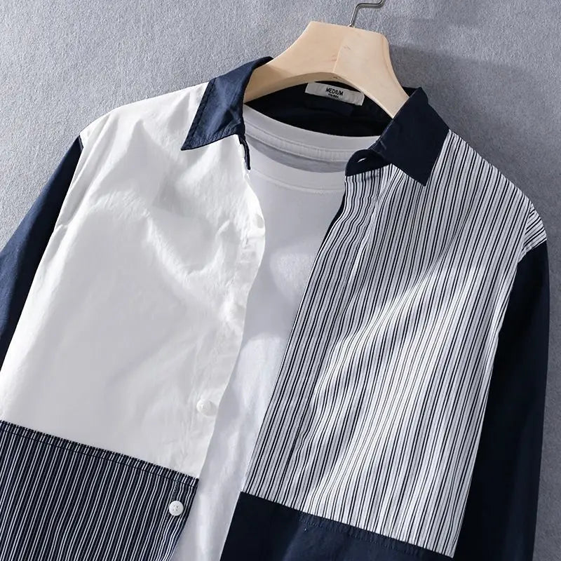 Close-up of a men's cotton blend short sleeve shirt featuring a contemporary contrast stripe design