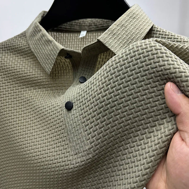 Versatile men's summer polo. Short sleeve textured basketweave shirt for smart casual or business casual outfits.