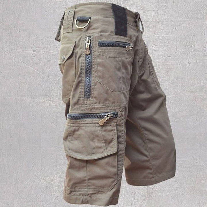 Durable men's multi-pocket cargo shorts designed for outdoor adventure, hiking & summer casual wear.