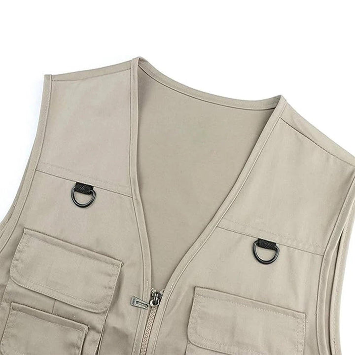 Lightweight men's travel vest for camping & adventures, featuring ample storage pockets.