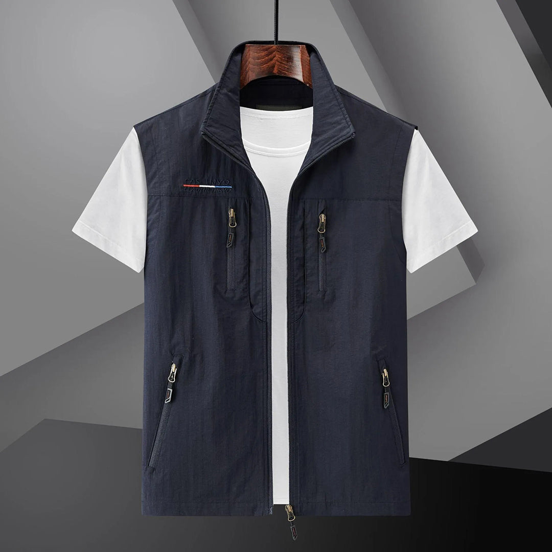 Men's multi-pocket outdoor utility vest. Ideal for travel, fishing, hiking. Breathable summer sleeveless jacket.