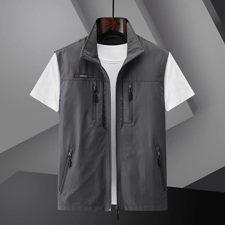 Durable men's fishing & hiking utility vest. Multi-pocket design, breathable for outdoor summer activities.
