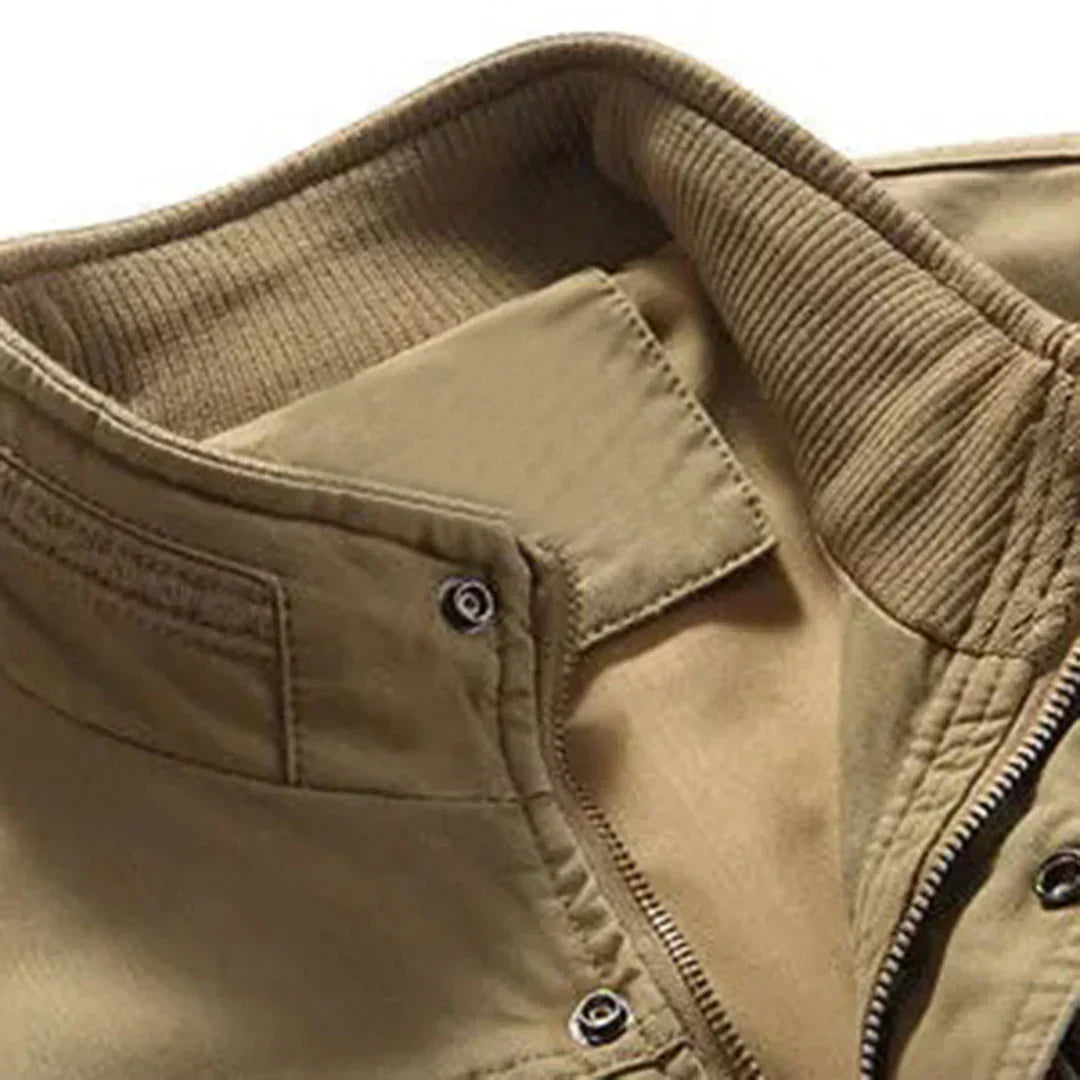 Men's sleeveless multi-pocket utility vest for hiking, travel, fishing & casual outdoor activities. Versatile gear.