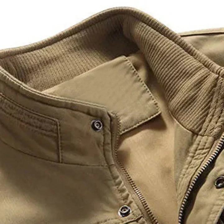 Men's sleeveless multi-pocket utility vest for hiking, travel, fishing & casual outdoor activities. Versatile gear.